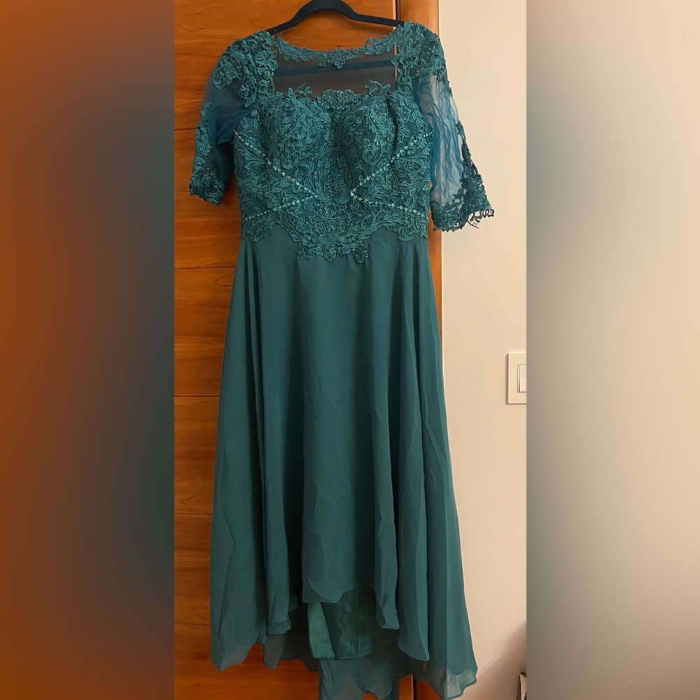 New Beautiful Women’s tea length dress with lace and chiffon detailing.